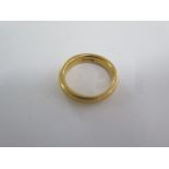 A 22ct yellow gold band ring size N - 4mm wide - approx weight 8 grams