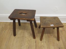 A 19th century elm country stool - Height 25cm - and a country painted stool - Height 36cm