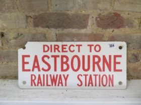 A 1970's plastic railway sign - Direct to Eastbourne Railway Station - chip to one corner - 20cm x