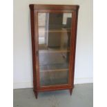 An early 1900's inlaid satinwood display cabinet with a single glazed door - Height 156cm x 74cm x