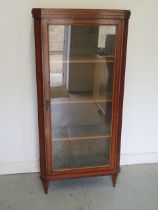 An early 1900's inlaid satinwood display cabinet with a single glazed door - Height 156cm x 74cm x