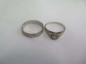 A 9ct white gold band ring and a matching 9ct solitaire ring size R - total weight approx 5.3 grams