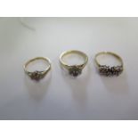 Three 9ct yellow gold rings sizes L and N - stone missing to one, others reasonably good - total