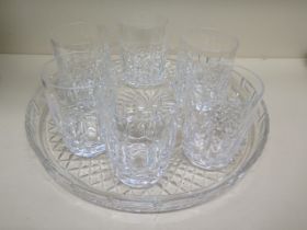 A Waterford glass circular tray - Diameter 35cm and six Waterford tumbler glasses - Height 11cm -