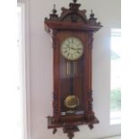 A walnut Vienna double weight wall clock - Height 135cm - not currently running