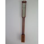 A good quality modern stick barometer - in working order, mercury intact