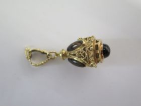 A gilt metal pendant with quartz like insets - Height 5.2cm - approx weight 12 grams - in good