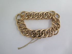 A 15ct yellow gold hollow link bracelet - approx weight 33.9 grams - some denting, wear and