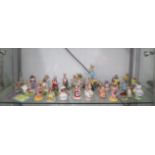 A collection of 36 Royal Albert, Royal Doulton and Beswick Bunnykins Beatrix Potter figures and a