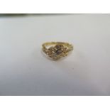 An 18ct yellow gold diamond ring size H/I - approx weight 2 grams - in good condition