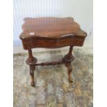 A Victorian burr walnut converted worktable/side table with a drawer above a slide - in good