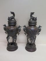 A pair of Oriental bronze lidded censors on stands - Height 41cm - both with good patina