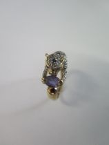 A 9ct yellow gold QVC Leopard ring size T - approx weight 4.2 grams - generally good