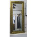 A large modern gilt wall mirror - 180cm x 80cm - in good condition