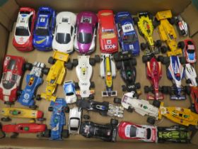 A collection of 31 Scalextric and other track cars