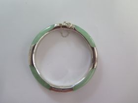 A jade/jadeite and 925 silver hinged bangle - Diameter 7cm - good condition