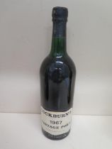 A 75cl bottle of Cockburns 1967 vintage Port - seal good, level to base of neck