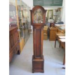 An oak case grandmother clock with chimes - Height 168cm - ticks but stops