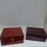 Two cigar humidors one by Sikarlan with key - 15cm x 31cm x 25cm - both have some marks to