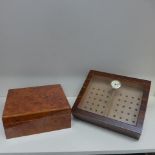 A rosewood effect counter top cigar humidor and a burr wood effect humidor - both generally good,
