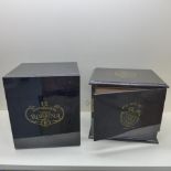 Two ebonised cigar humidor cabinets one with six drawers the other with five internal and one base