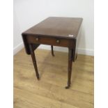 A Georgian mahogany small Pembroke table on ring turned legs - good quality and condition, one