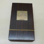 A Linley wooden cigar case with silver plaque - 15cm x 8.5cm x 2.5cm - crazing to veneer and dent,