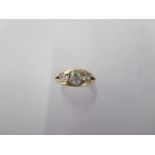 An 18ct yellow gold three stone diamond ring size O - the central diamond approx 6mm x 5mm x 3.5mm
