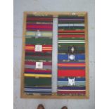 A mounted display of 20 Military belts - 101cm x 77cm