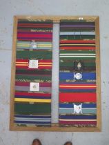 A mounted display of 20 Military belts - 101cm x 77cm