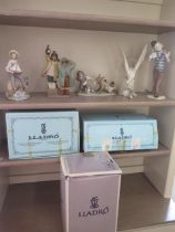 Three Lladro groups - A Clown, boxed and a Bird, boxed - including Ahoy There, boxed and two other