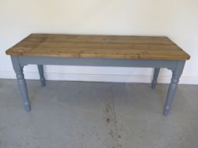 A pine kitchen table with a painted base and thick four plank top - Height 77cm x 178cm x 70cm