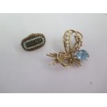 A 9ct yellow gold pearl brooch - Width 4cm - approx weight 8 grams and a gilt metal snake Mourning