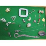 A collection of assorted costume jewellery and an enamel white metal buckle - in good condition -