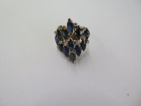 An 18ct yellow gold geometric cluster dress/cocktail ring - size P - approx weight 6 grams - in good