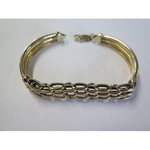 A 9ct yellow gold bracelet approx 17 grams - generally good, some wear to end ring