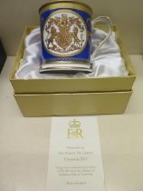 A Christmas 2013 Elizabeth II tankard Christmas present with card and box - in good condition