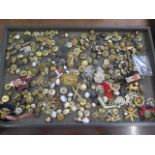 A collection of assorted Military buttons and badges