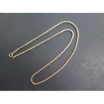 A yellow metal 61cm chain - tests to approx 9ct, approx weight 21.9 grams - in good condition