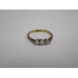 An 18ct yellow gold three stone diamond ring size L - approx weight 1.7 grams - diamonds bright
