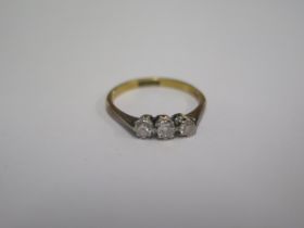 An 18ct yellow gold three stone diamond ring size L - approx weight 1.7 grams - diamonds bright