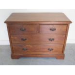 A circa 1900's oak arts and crafts chest of two over two drawers on a plinth base - Height 81cm x
