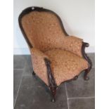 A Victorian style armchair recently reupholstered - in good condition