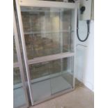 A large good quality shop display cabinet with sliding doors - Height 183cm x Width 100cm x Depth