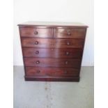 An early Victorian flame mahogany chest of two over four graduated drawers on a plinth base - Height