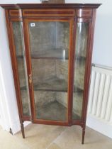 An Edwardian inlaid mahogany corner display cabinet with a single door - Height 138cm x Width 75cm -