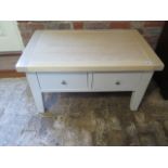 A painted two drawer coffee table with light oak top - Height 50cm x 90cm x 55cm