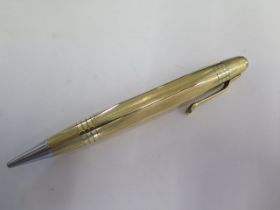 A Mont Blanc gilt plated pencil - Length 11cm - mechanism seems seized, some wear to plate