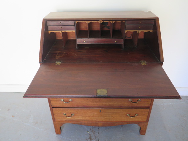 A 19th century mahogany four drawer bureau with a fitted interior - Height 111cm x 92cm x 50cm - Image 2 of 2