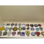 A collection of 30 motoring/car badges